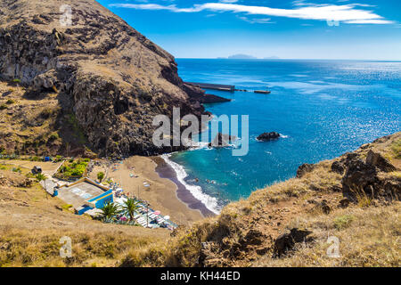 Prainha Beach tucked away between cliffs - the only sandy beach in Madeira, Portugal Stock Photo