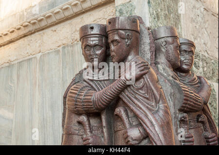 Portrait of the four Tetrarchs at Doge’s Palace in San Marco, Venice, Italy. The sculpture from the 4th century was claimed during a crusade. Stock Photo