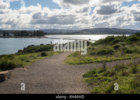Victor Harbor, South Australia: July 10, 2017 - View from Granite Island. Sight seers and the icon horse drawn tram can be seen crossing the causeway  Stock Photo