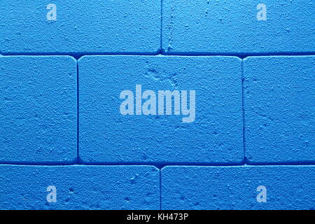 Abstract background of blue brick wall in the room with seam pattern. Stock Photo