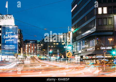 Helsinki, Finland - December 7, 2016: Night View Of Traffic Light Trails In Kaivokatu Street In Evening Or Night Illumination. Stock Photo