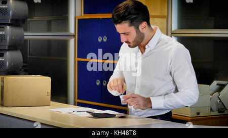 Man looking at documents Stock Photo