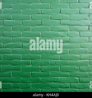 part of dark green painted brick wall Stock Photo