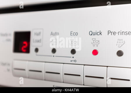 Control panel of white dishwasher set at Quick  wash mode Stock Photo