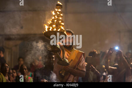 Varanasi Ganga aarti ceremony rituals performed by Hindu priests at Dashashwamedh Ghat at Varanasi, India. Stock Photo