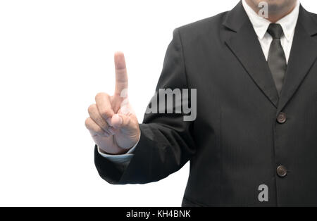 Young executive man touching an imaginary screen isolated on white background, Stock Photo