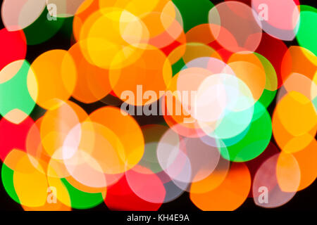 Bright blurred festive and colorful Christmas lights abstract background texture. Concept for party xmas new year eve rave psychedelic strobes disco Stock Photo