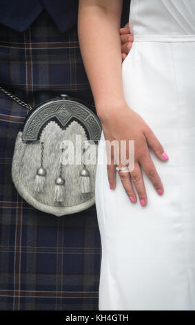 Closeup of  Bride and Groom Wearing a Kilt at Wedding in Scotland Stock Photo