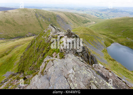 Blencathra, looking down Sharp Edge towards Scales, with Scales Tarn at right. Near Penrith, Lake District, Cumbria, England. Also known as Saddleback Stock Photo