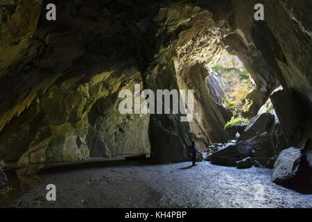 Cathedral cave or cavern in Little Langdale, the English Lake District. This is part of a disused quarry. Public access is via a long walk in tunnel Stock Photo