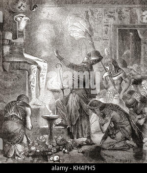 An Egyptian king worshipping the God Horus in a temple.  From Ward and Lock's Illustrated History of the World, published c.1882. Stock Photo