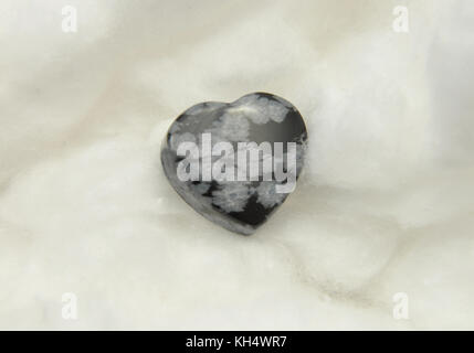 Snowflake obsidian on cotton Stock Photo