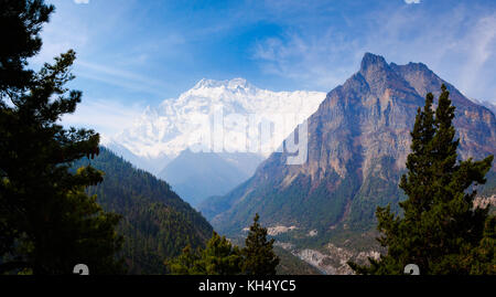 View down over the Marsyangdi River valley and across to Annapurna II from the path to Ghyaru, on the Annapurna Circuit Trek, Nepal Stock Photo