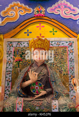 Tibetan buddhist sculptures made by monks from coloured butter in Labrang monastery, Gansu province, Labrang, China Stock Photo