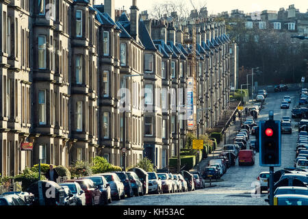 View of row of sandstone terraced apartment buildings (tenements) on Comely Bank Avenue in Edinburgh, Scotland, United Kingdom Stock Photo