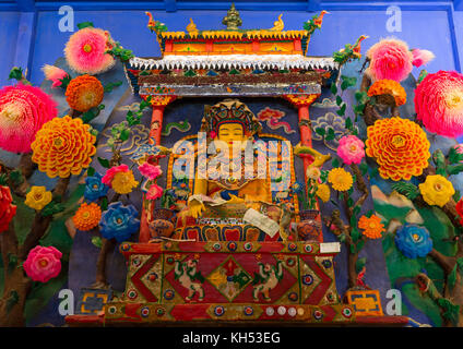 Tibetan buddhist sculptures made by monks from coloured butter in Labrang monastery, Gansu province, Labrang, China Stock Photo