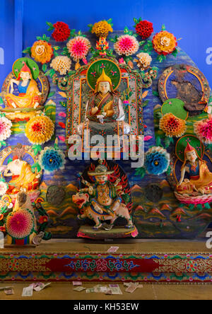 Tibetan buddhist sculptures made by monks from coloured butter in Labrang monastery, Gansu province, Labrang, China Stock Photo