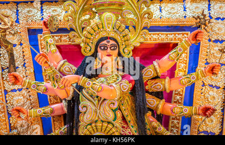 Goddess Durga in traditional look at a Durga Puja at Kolkata. Hindu goddess Devi Durga is worshiped in India and a popular festival event. Stock Photo