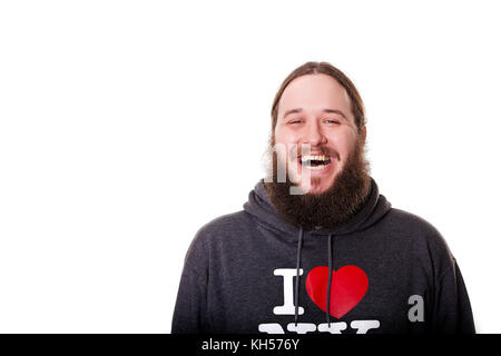 Happy hipster man with long brunette hair, laughing, smiling Stock Photo