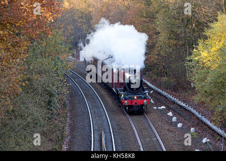 Jubilee Class locomotive 45699 'Galatea' passing Sowerby Bridge on the Calder Valley line with a special excursion, West Yorkshire Stock Photo