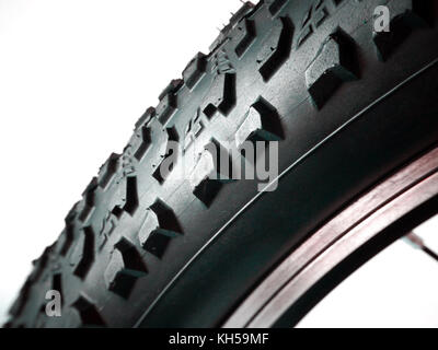 Macro of MTB bicycle tire isolated on white background Stock Photo