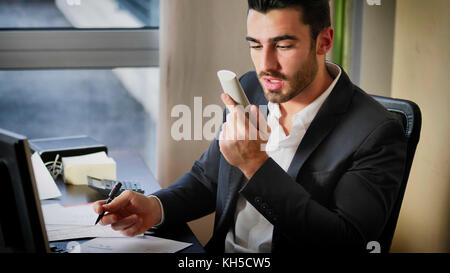 Man shouting while having phone talk Stock Photo