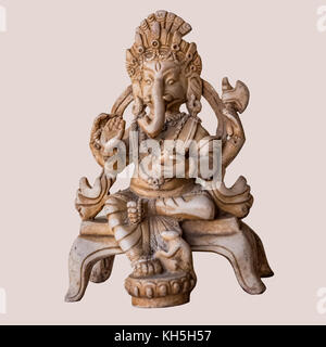 Ancient stone Ganesha Hindu God in textured background with selective focus Stock Photo