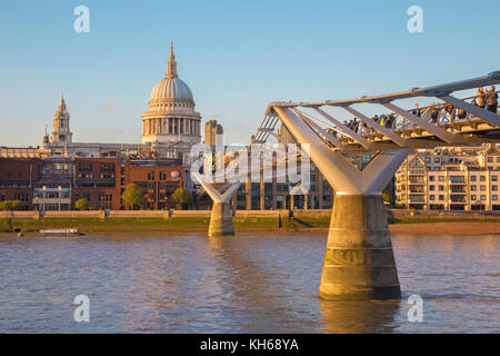 LONDON, GREAT BRITAIN - SEPTEMBER 19, 2017: The Millennium bridge and St. Pauls cathedral in evening light. Stock Photo