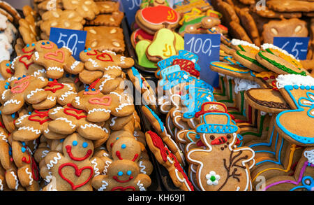 Gingerbread man cookies and other traditional Christmas biscuits on the stall. Stock Photo