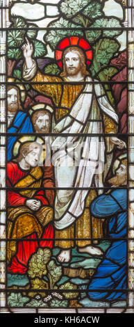 LONDON, GREAT BRITAIN - SEPTEMBER 17, 2017: The Apparition of resurected Jesus to apostle on the stained glass in church Holy Trinity Brompton. Stock Photo
