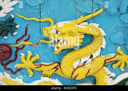 On 12.11.2016.Russia.Saint-Petersburg.Chinese dragons on the wall painted in the style of majolica. Stock Photo