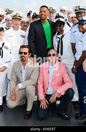 Josh Brolin, Will Smith, and director Barry Sonnenfeld at The Intrepid promoting the film Men In Black III, May 23, 2012. Copyright Kristen Driscoll / Media Punch Stock Photo