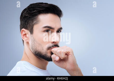 Confident smart worker looking determined and concentrated Stock Photo