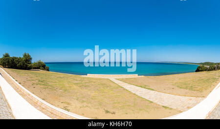 High Resolution panoramic view of Stone memorial on the beach at Anzac Cove in Gallipoli where allied troops fought in World War 1 in Canakkale Turkey Stock Photo