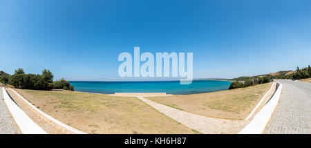 High Resolution panoramic view of Stone memorial on the beach at Anzac Cove in Gallipoli where allied troops fought in World War 1 in Canakkale Turkey Stock Photo