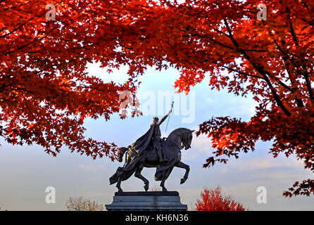 November 3, 2017 - St. Louis, Missouri - Fall foliage around the Apotheosis of St. Louis statue of King Louis IX of France in Forest Park, St. Louis,  Stock Photo