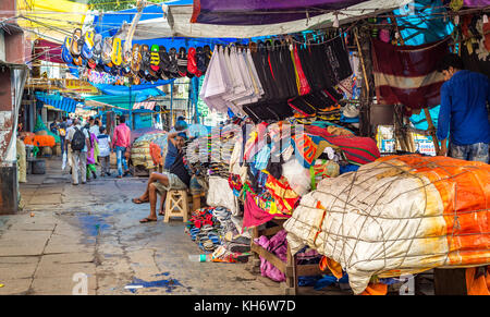Indian city road pavement shops at New Market area of Kolkata with vendors displaying their wares Stock Photo