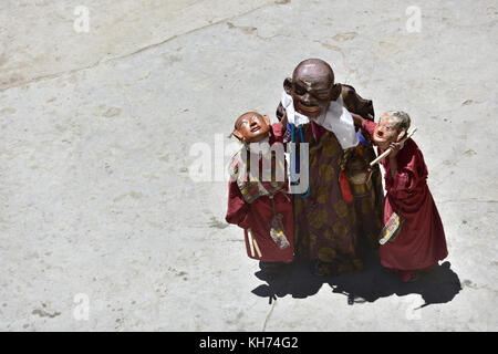 Buddhist festival, lamas in masks depict Khashin Khan and his two sons, the Himalayas, Tibet. Stock Photo