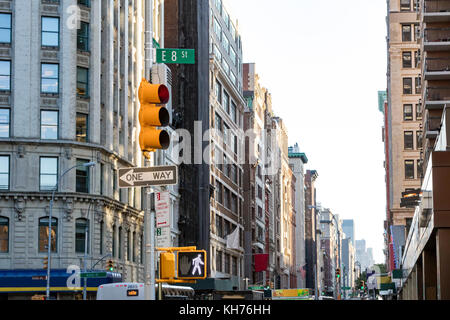 View of crowded city streets looking down Broadway from the intersection of 8th Street in Manhattan, New York City NYC Stock Photo