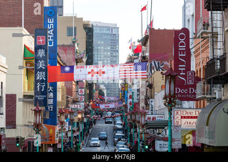 SAN FRANCISCO - CIRCA 2017: Signs for restaurants and businesses crowd the sidewalks along Jackson Avenue in Chinatown,  San Francisco, CA Stock Photo