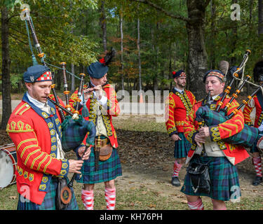 Reenactment actors portraying the 42nd Highlanders Regiment, Black Watch, of the 1700's, drum and pipes. Stock Photo