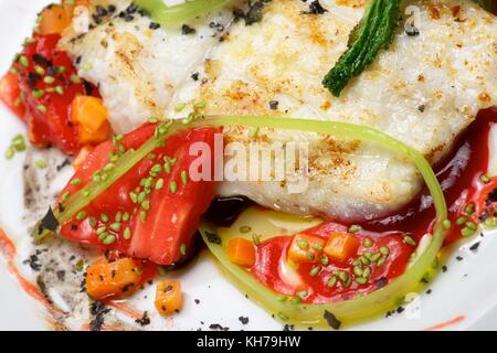 Conger with vegetables and spicy sauce. Stock Photo