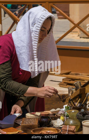 Medieval scribe writing calligraphy Stock Photo