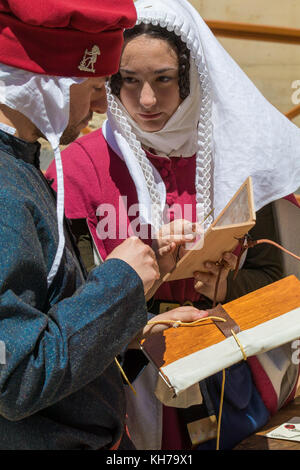 Medieval scribes  writing calligraphy  Stock Photo