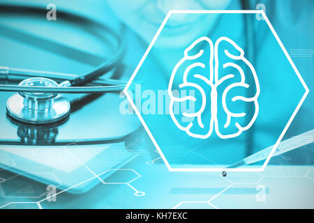 Digital background with brain sign  against stethoscope on digital tablet Stock Photo
