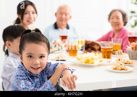 happy asian family having dinner at home Stock Photo