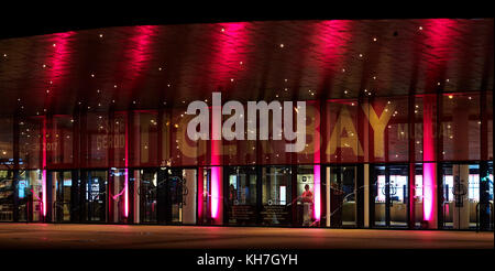 Cardiff, Wales UK. 13th November 2017. The Millennium Centre illuminated advertising the Musical 'Tiger Bay' Opening nigh With John Owen-Jones as the Third Marquess of Bute. Set and based around Cardiff’s Butetown area and the docks during the early 1900s, the area was known locally as Tiger Bay. Phill Thomas / Alamy Live News Stock Photo