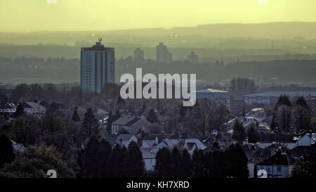 Glasgow, Scotland, UK 16th November. UK Weather, bright sunshine and heavy rain over knightswood and the distant  tower blocks in the south of the city. Credit: gerard ferry/Alamy Live News Stock Photo