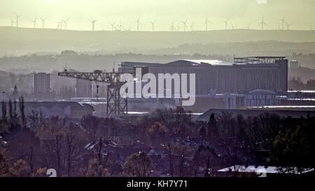Glasgow, Scotland, UK 16th November. UK Weather, bright sunshine and heavy rain over barclay curle crane and the Queen Elizabeth University Hospital in the south of the city. Credit: gerard ferry/Alamy Live News Stock Photo