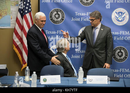 Austin, USA. 15th Nov, 2017. U.S. Vice President Mike Pence (left) visits Federal Emergency Management Agency (FEMA) Texas regional office with Energy Secy. Rick Perry (right) for a Hurricane Harvey recovery update from Texas Gov. Greg Abbott (center). Credit: Bob Daemmrich/Alamy Live News